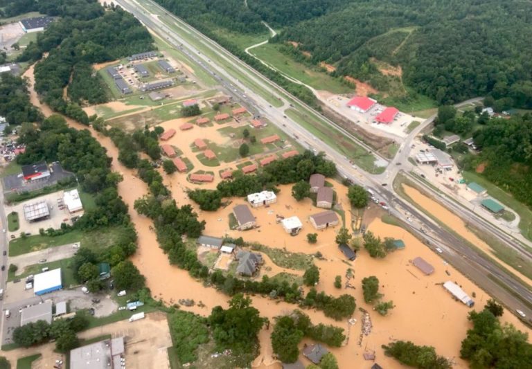 At least 21 killed in historic flood